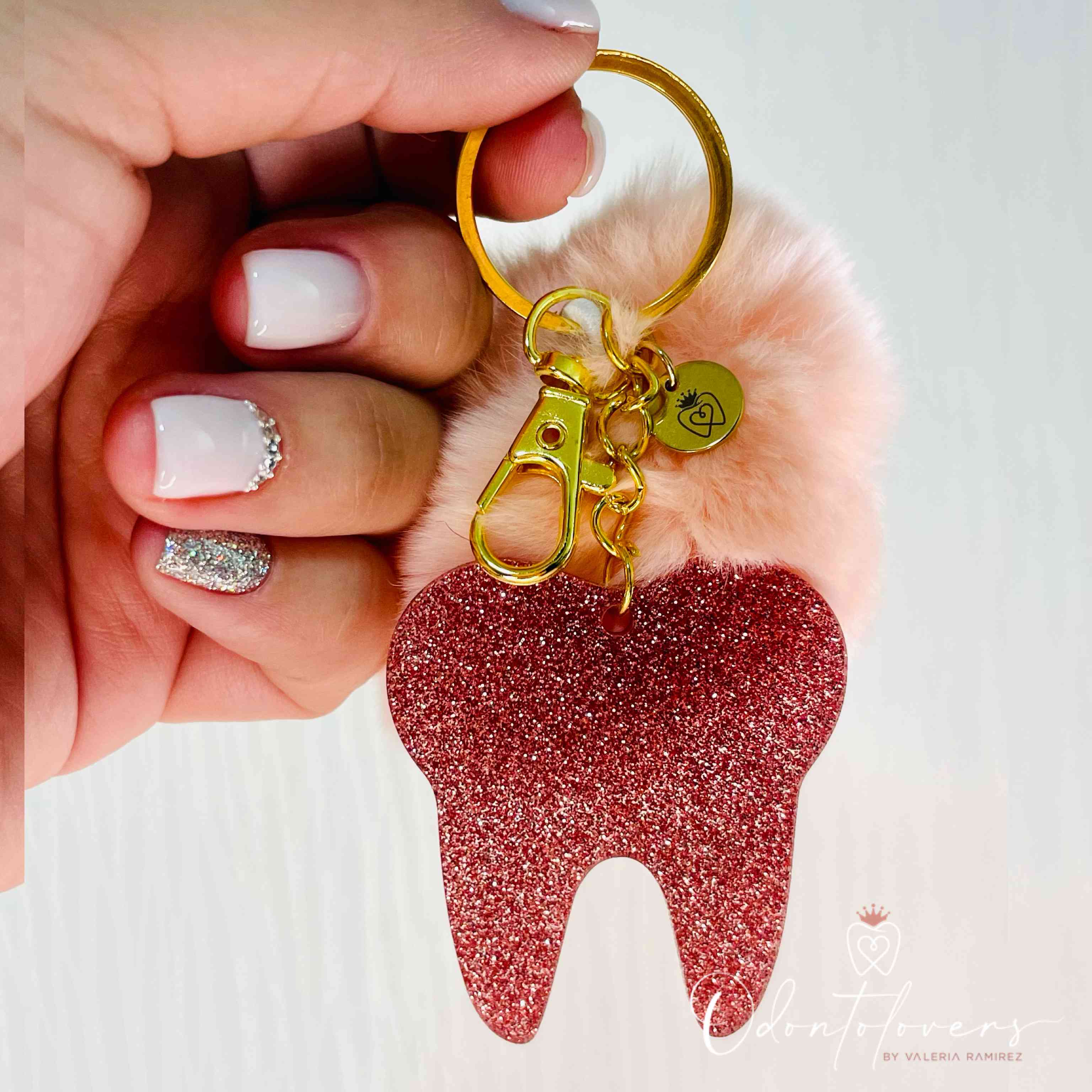 Llavero molar glitter pompón rosa