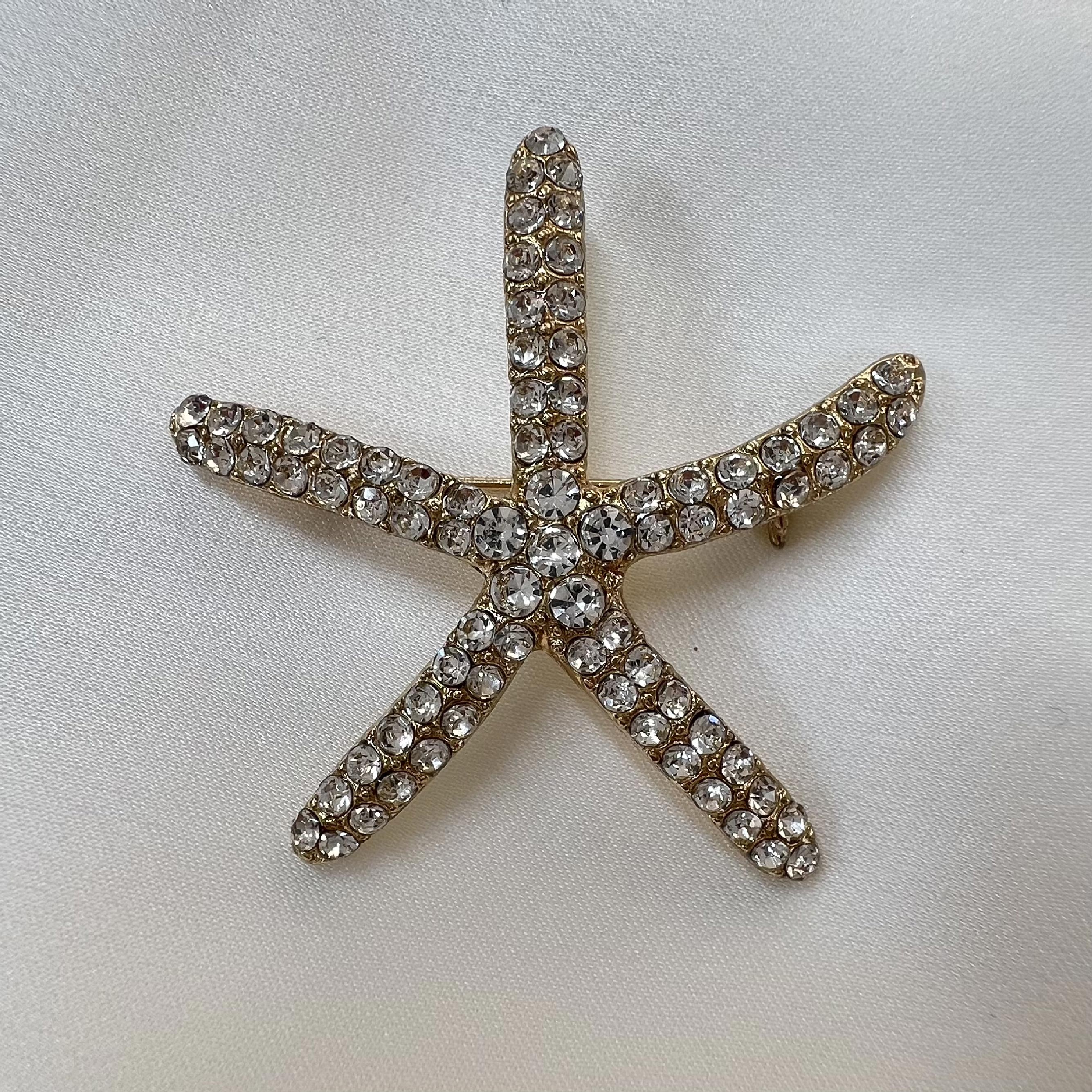 PRENDEDOR ESTRELLA DORADO 
